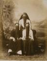 [Three Mid-Eastern women in traditional dress]