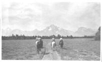 Riders approaching mountains, Wyoming Trip