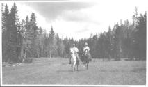 George Eastman and camping companion on horses, Wyoming Trip