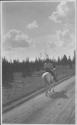 Man riding horseback on trail, Wyoming Trip
