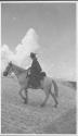 Camping companion riding horseback, Wyoming Trip