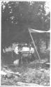 Eastwoods dining with Josephine Dickman at campsite, Wyoming Trip