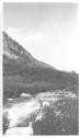 George Eastman over stream, Wyoming Trip