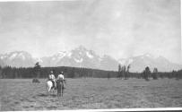 Riders approaching mountains, Wyoming Trip