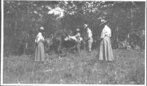 Eastwoods and Josephine Dickman looking at packhorse, Wyoming Trip