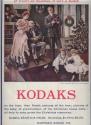 Advertisement for Kodaks and Brownies featuring family at Christmas