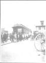 People standing near rail car at train station, Oak Lodge Trip