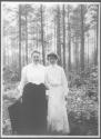 Adelaide Hubbell and Mary Mulligan in forest, Oak Lodge Trip