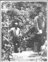 Walter Hubbell and unidentified man in forest, Oak Lodge Trip
