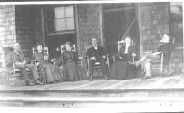 George Eastman and guests on porch, Oak Lodge Trip