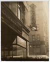[Commercial buildings with "Credit" sign]