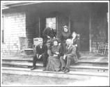George Eastman and guests on porch, Oak Lodge Trip