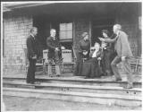 George Eastman and guests on porch, Oak Lodge Trip