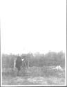 Man with camera tripod, Oak Lodge Trip