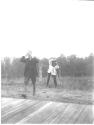 George Eastman walking away from camera, Oak Lodge Trip