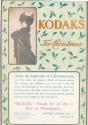 Advertisement for Kodak and Brownie Cameras featuring the Kodak Girl