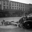 [Children, car and peppers in front of the Broad Street Theater]