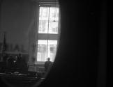 [Looking into an office with a tall window]