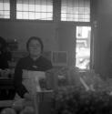 [Woman selling fruits]