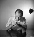 [Beaumont Newhall lighting his cigarette]
