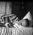 [Beaumont Newhall in bed]