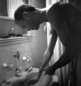 [Beaumont Newhall in bathroom]