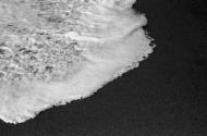 [Froth of wave on beach]