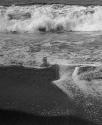 [Waves breaking on beach]