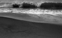 [Waves breaking on beach]