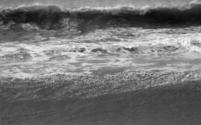 [Waves breaking on beach]