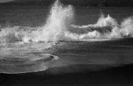 [Waves breaking on beach]