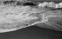[Waves breaking on beach]