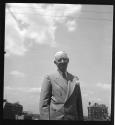 [Charles Sheeler standing on roof in New York City]