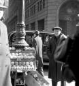 [Street vendor selling fruit]