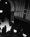 [View from above of people standing below]