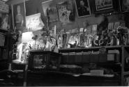 [Room cluttered with artifacts]