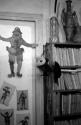 [Images of jesters and a bookshelf]