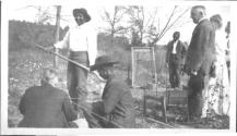 George Eastman and guests inspecting cornerstone of cabin, Oak Lodge Trip