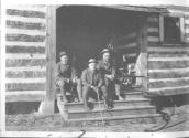 Walter Hubbell, George Eastman and Edward Mulligan on steps, Oak Lodge Trip