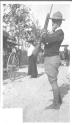 George Eastman holding rifle, Oak Lodge Trip