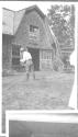 George Eastman near barn, Oak Lodge Trip