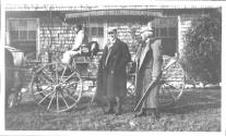 Edward Mulligan and Walter Hubbell beside carriage, Oak Lodge Trip