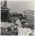 Peggy Guggenheim, heiress, art collector, patroness, and philanthropist, on the roof of her Palazzo Venier dei Leoni, which overlooks the Grand Canal, Venice