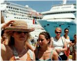 [Pleasure cruise tourists from the yachts "Sensation" and "Fascination" on the dock]