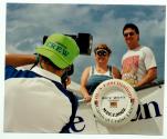 [Couple on cruise ship photographed by crew member]