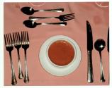 [Table place setting, with soup]