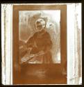 [Reproduction of a ca. 1840 engraved (?) portrait of a seated woman with a book.]