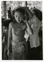 Dancer preparing for performance of Legong dance