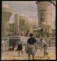 [People playing a game on the deck of a ship]