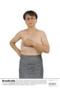 [Breast Cancer Placard, image of woman wearing glasses and denim skirt, left arm across chest]